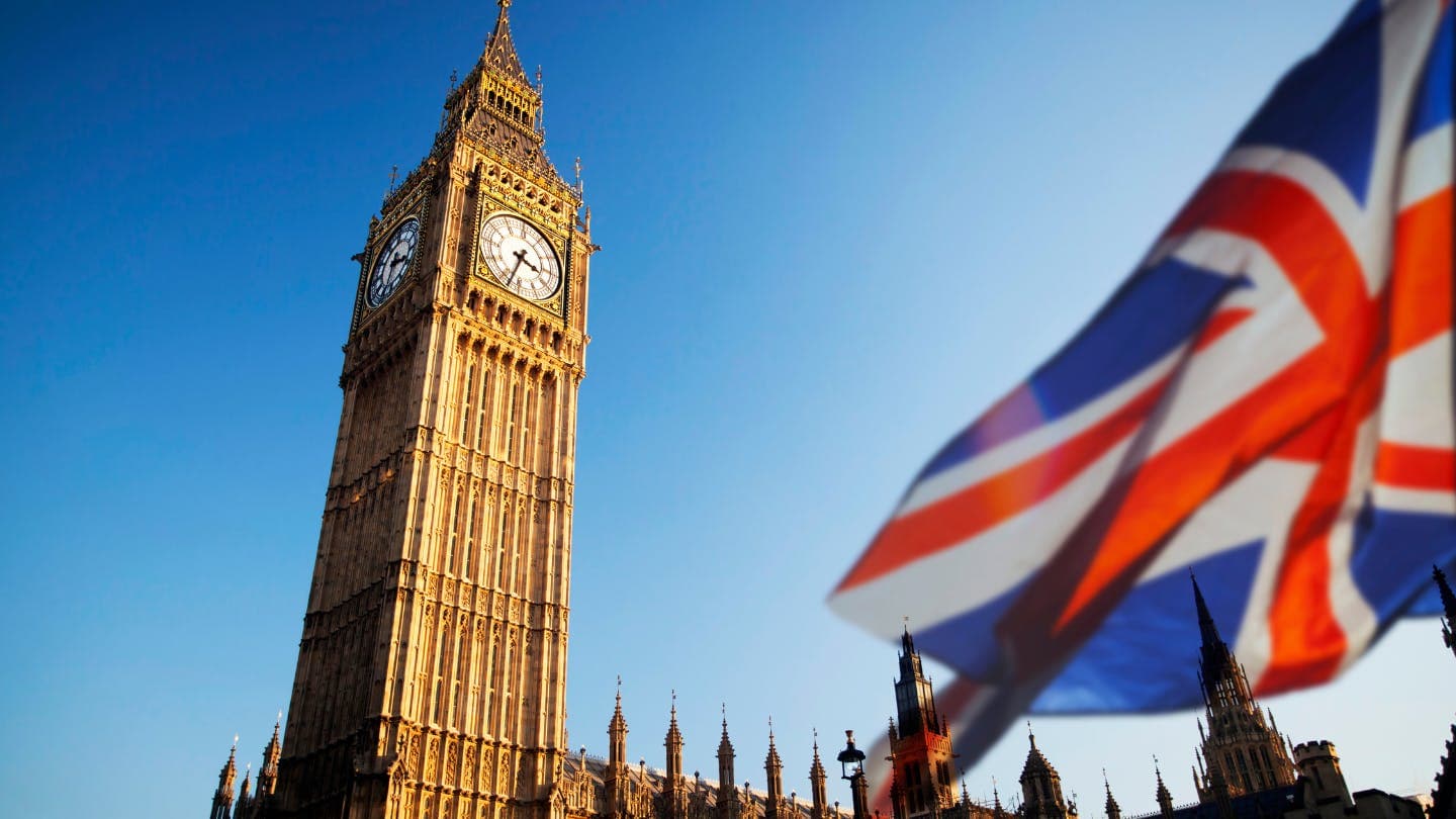 Big Ben with the Union Jack flag in the foreground.