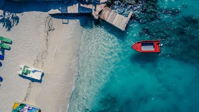 Aerial view of beach and boat