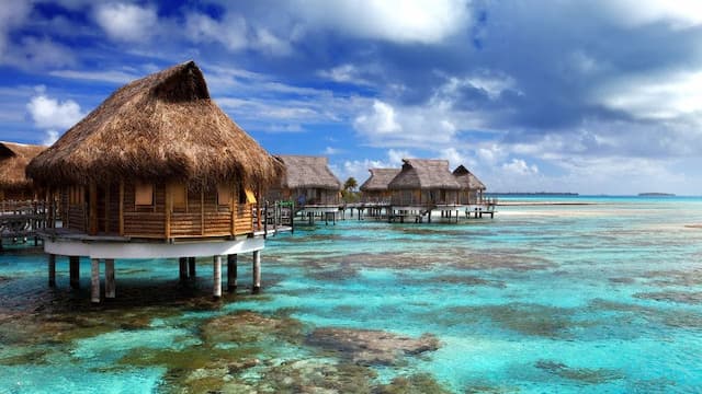 Overwater bungalows in the Maldives lagoon