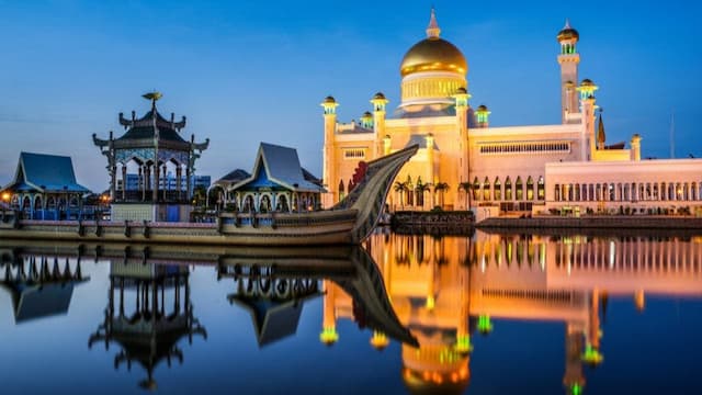 Beautiful illuminated mosque at sunset in Brunei